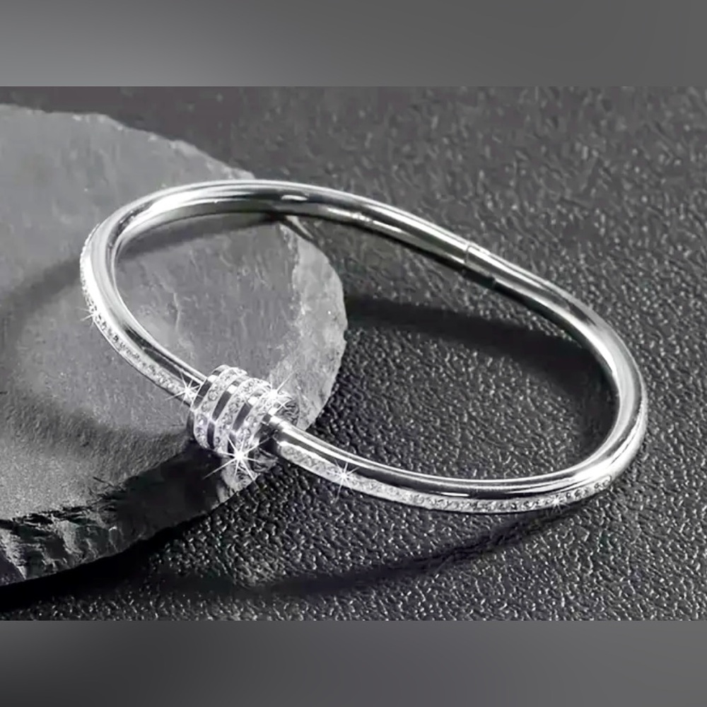 Elegant Silver Bangle Accented With Cubic Zirconia Stones